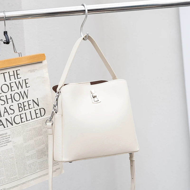 2026 Hot Sale Women Retro Lock Crossbody Shoulder Bag Genuine Leather Fashion luxury designer Bucket Bag for Daily Work