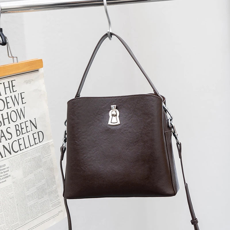 2026 Hot Sale Women Retro Lock Crossbody Shoulder Bag Genuine Leather Fashion luxury designer Bucket Bag for Daily Work