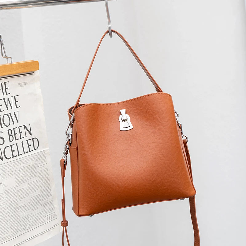 2026 Hot Sale Women Retro Lock Crossbody Shoulder Bag Genuine Leather Fashion luxury designer Bucket Bag for Daily Work